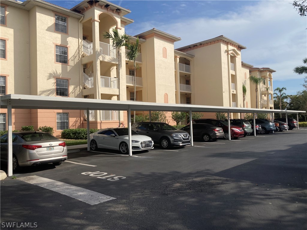 a view of a street with cars