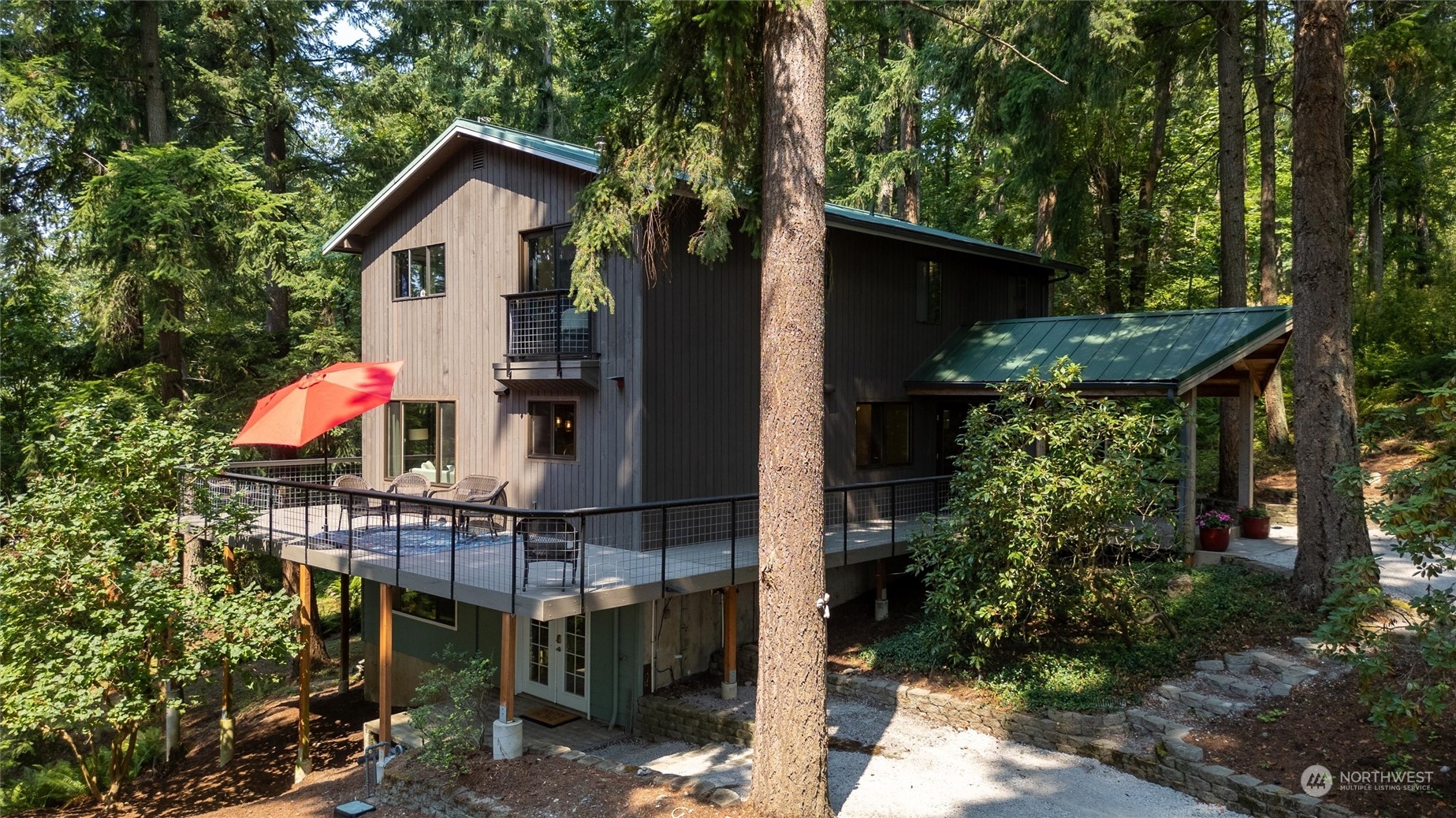 a view of house with outdoor space and seating