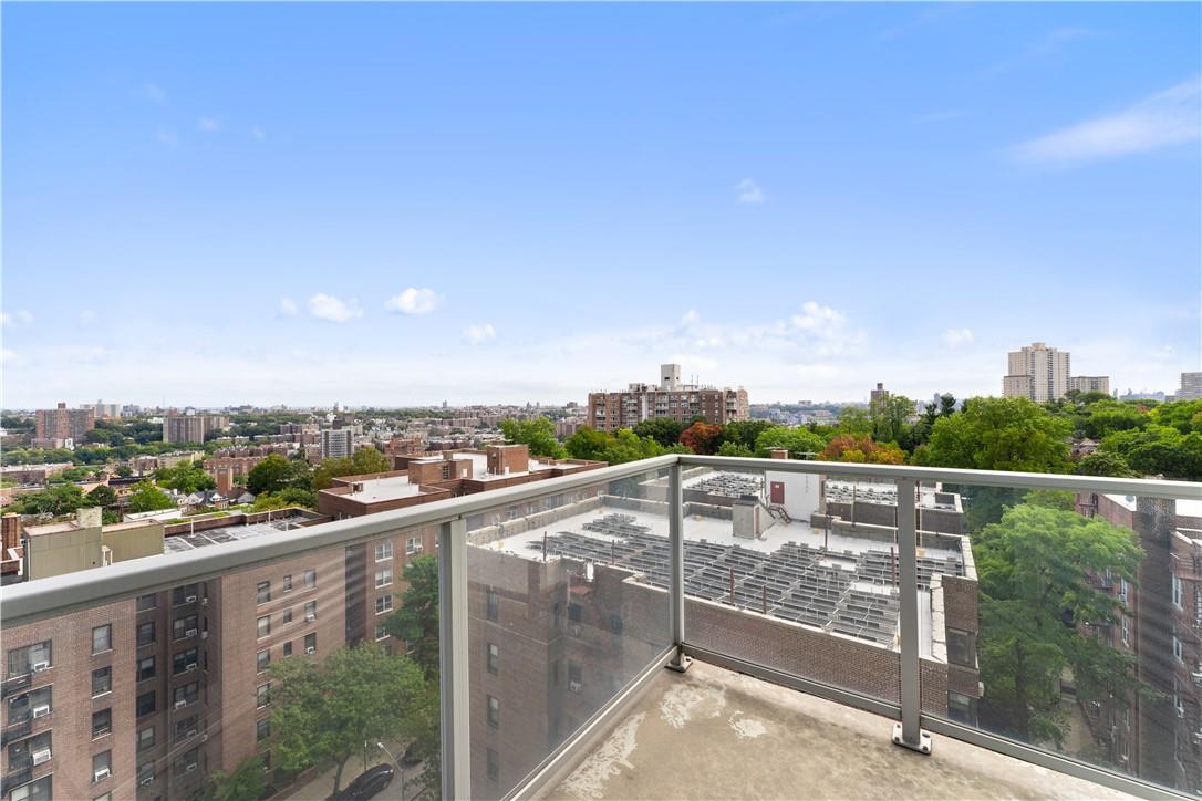 a view of a balcony with city view