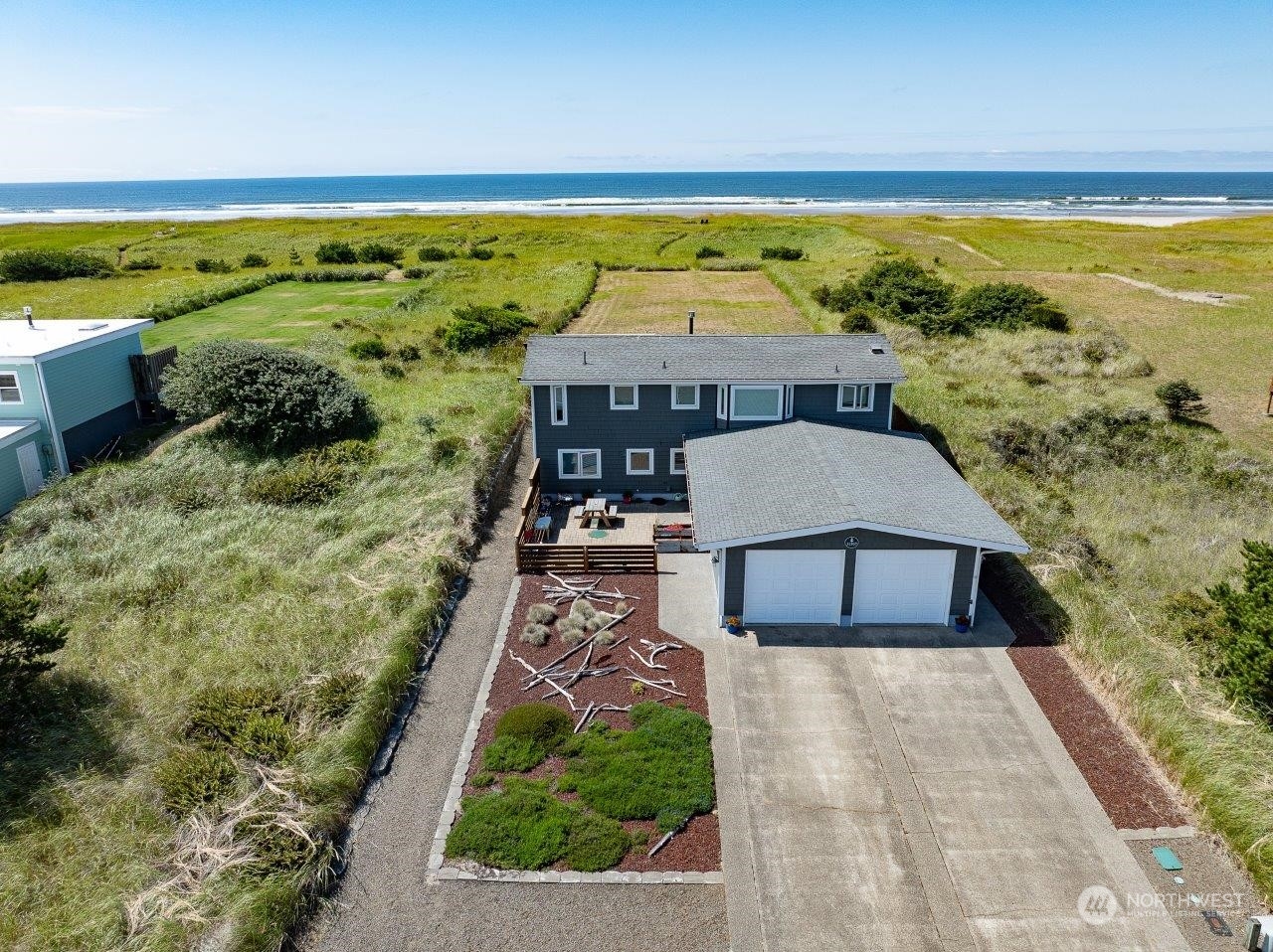 a aerial view of a house with a yard