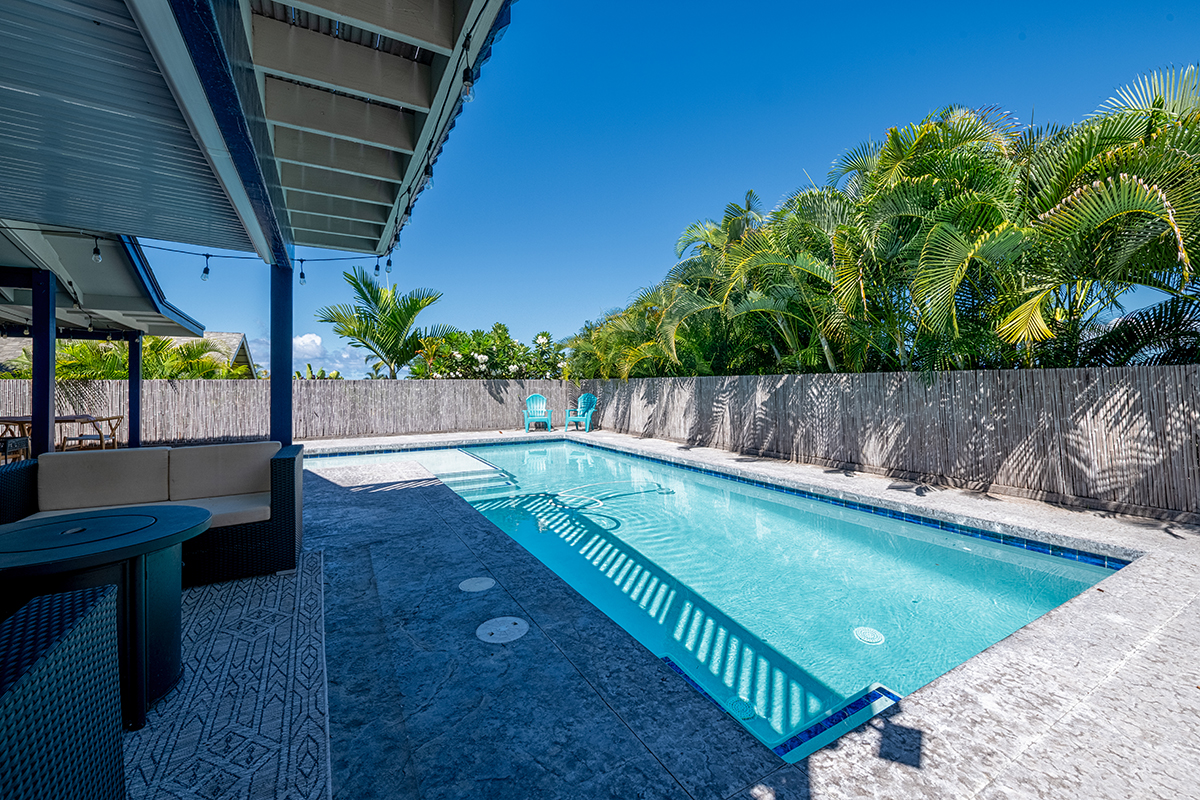 a view of a backyard with a tub