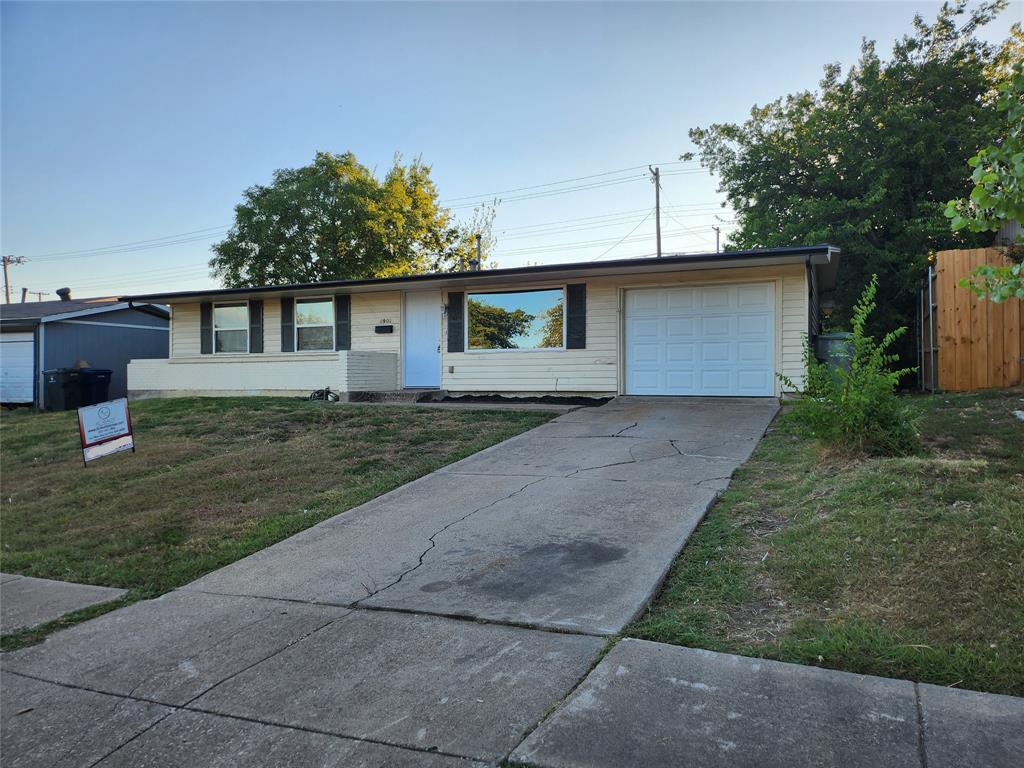 a front view of a house with yard