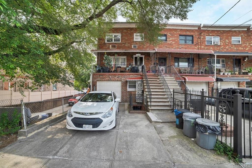 a car parked in front of a houses