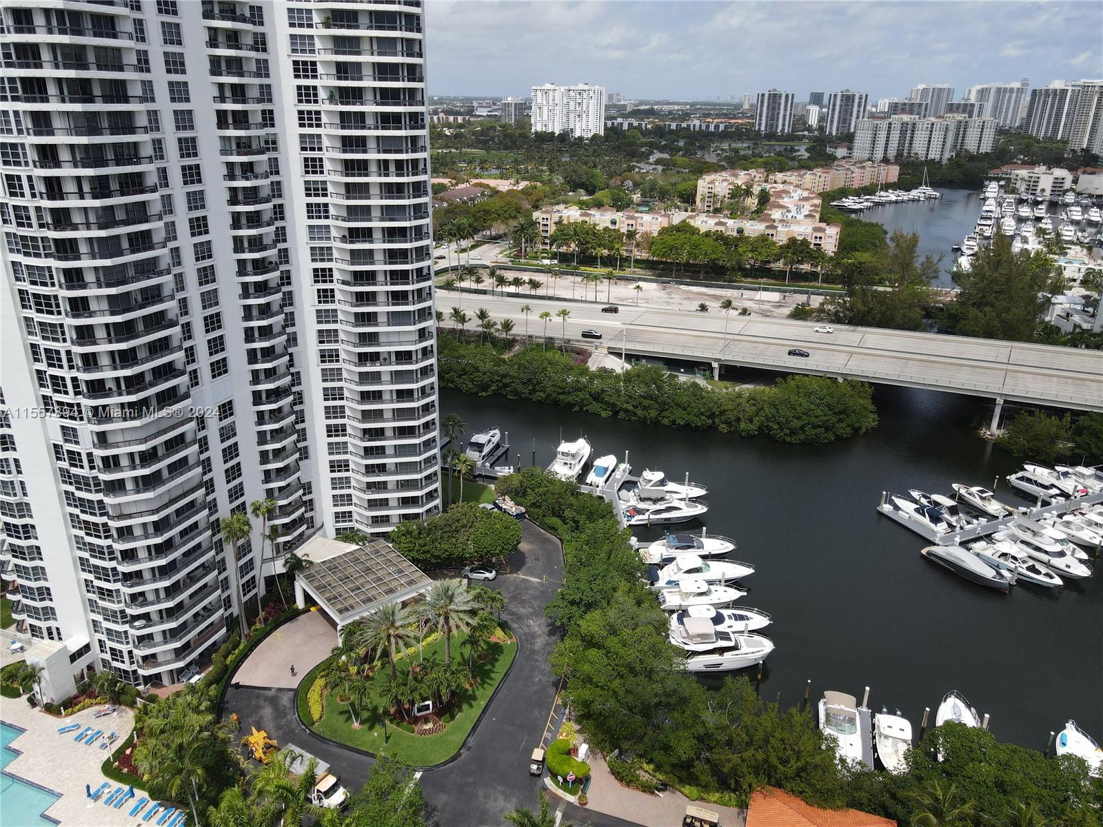 a view of a lake with a residential building and lake view