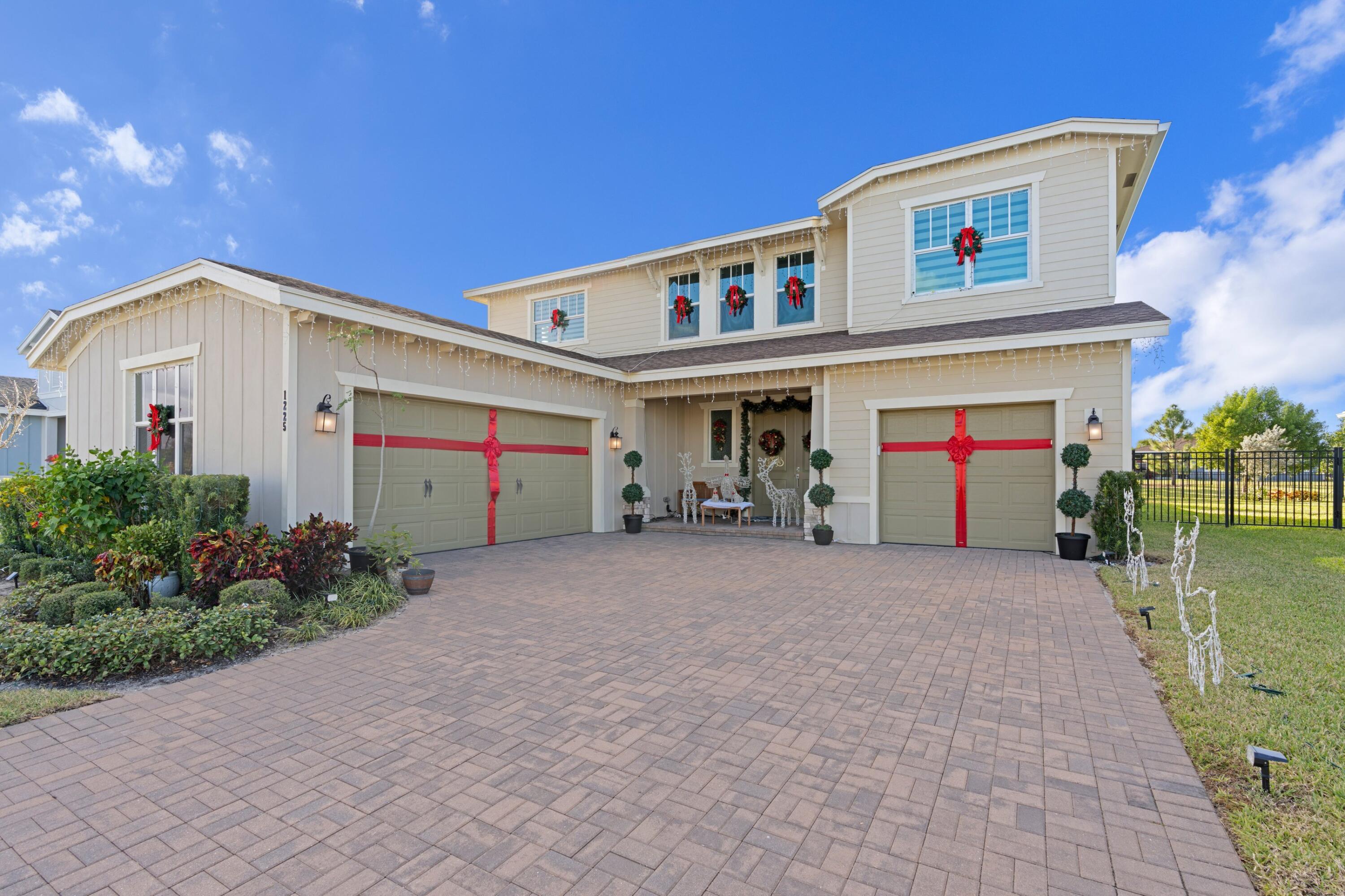 a front view of house with an outdoor space and seating area