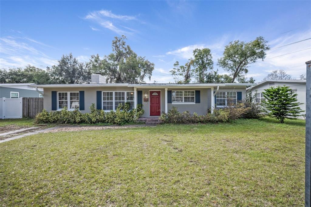 front view of a house with a yard