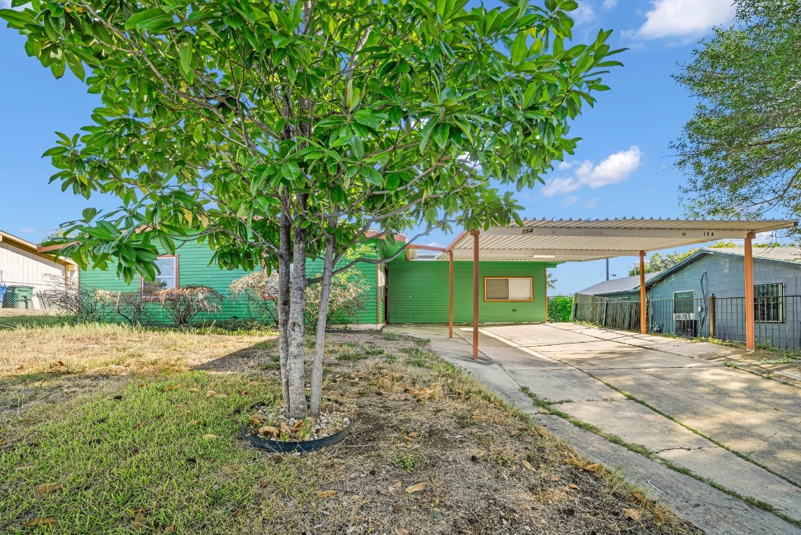 a backyard of a house with trees