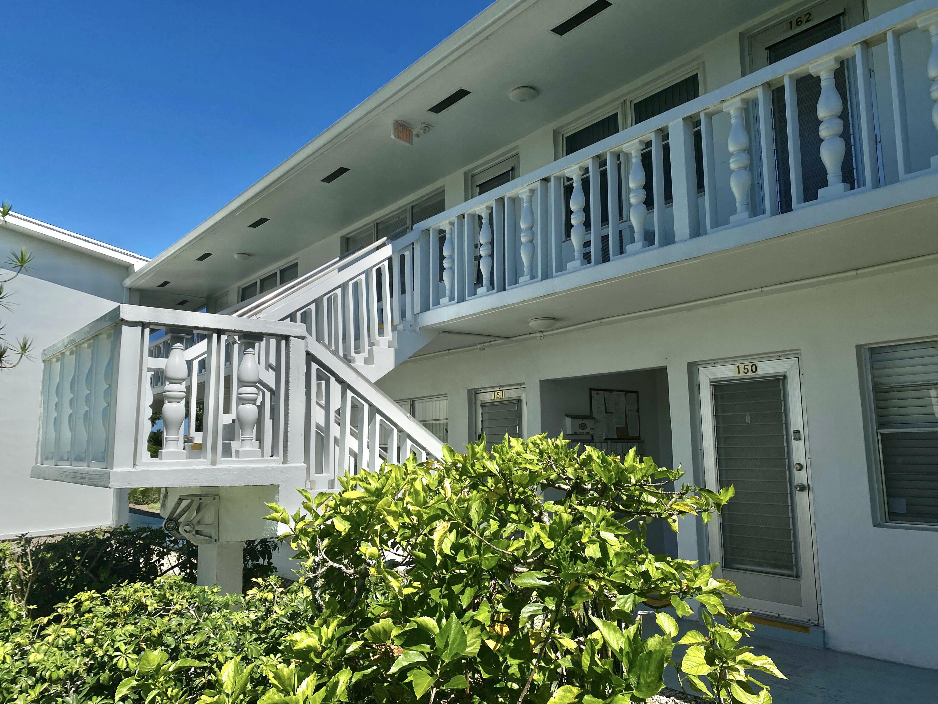 a view of balcony with small garden and plants