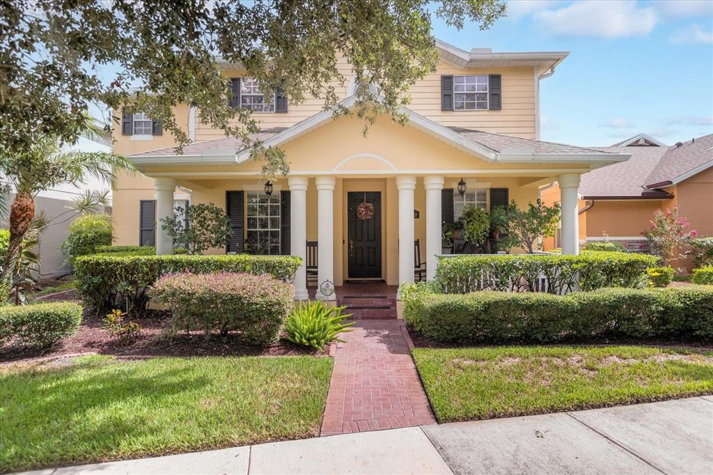 front view of a house with a yard