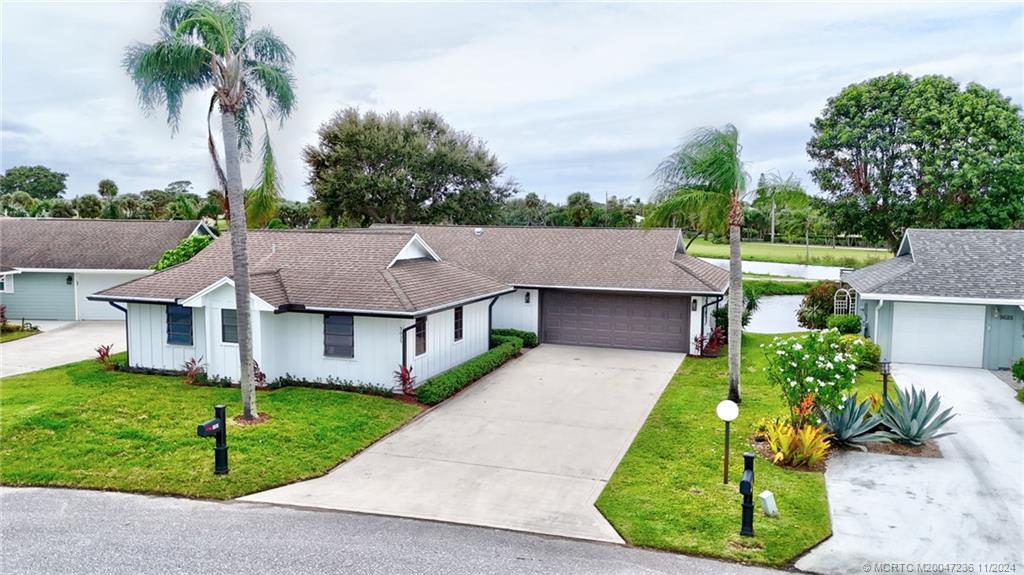 front view of house with a yard