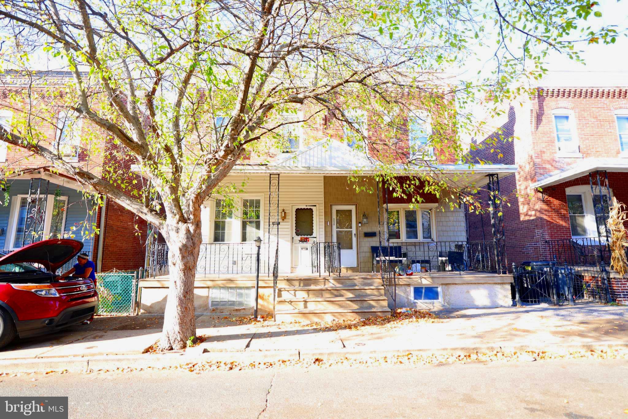 a front view of a building with street view