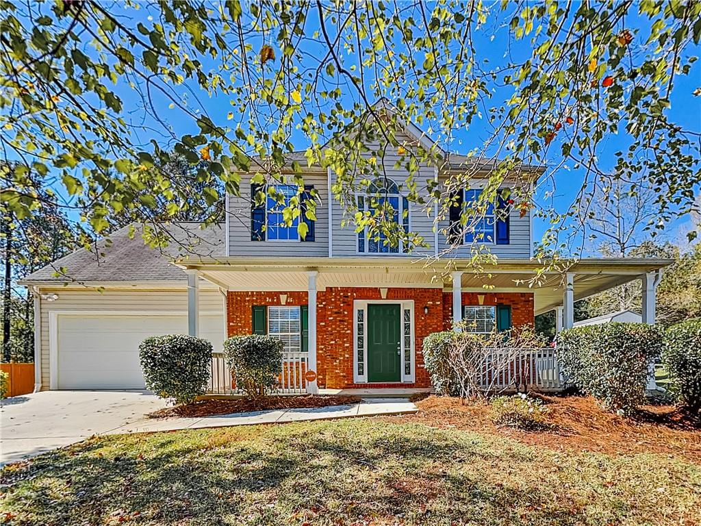 front view of a house with a big yard