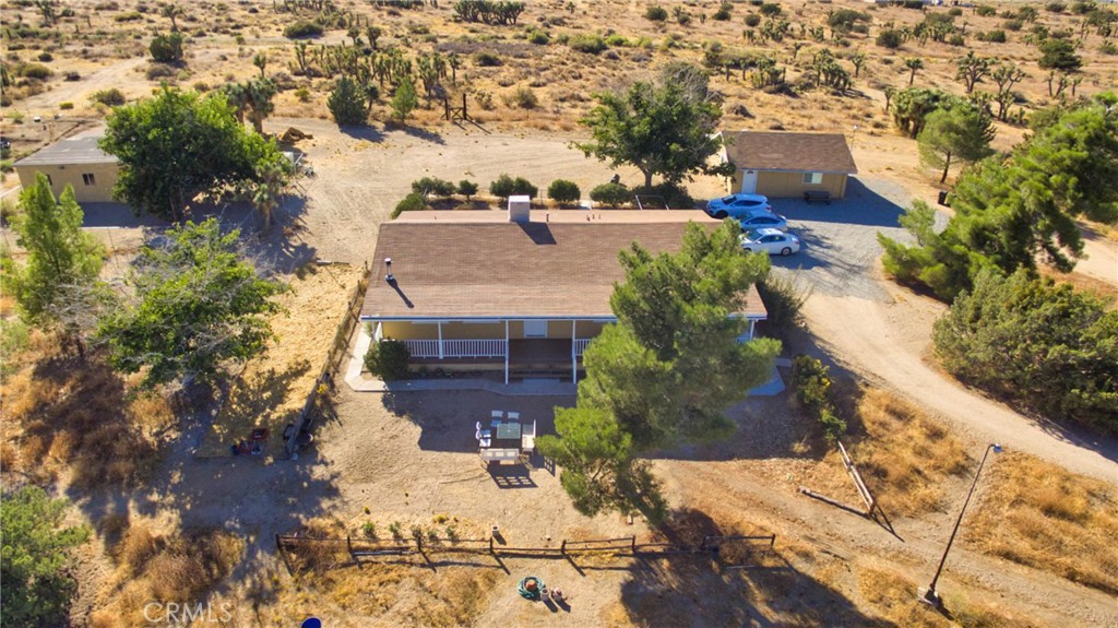 a view of house with yard