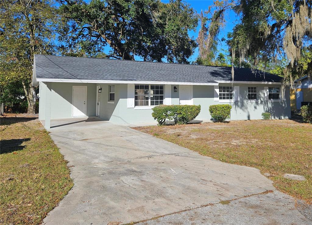 front view of a house with a yard