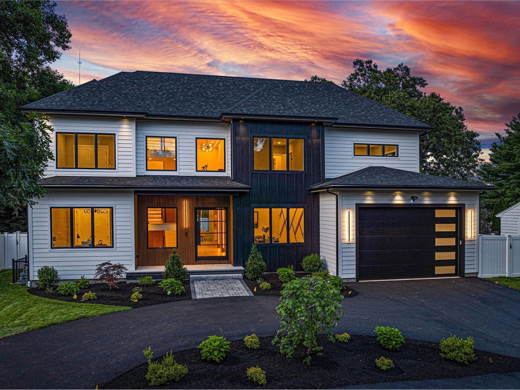 a view of a brick house with many windows