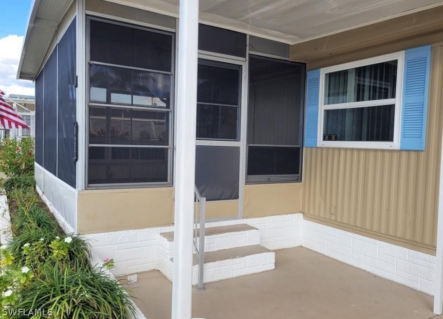 a view of balcony with door