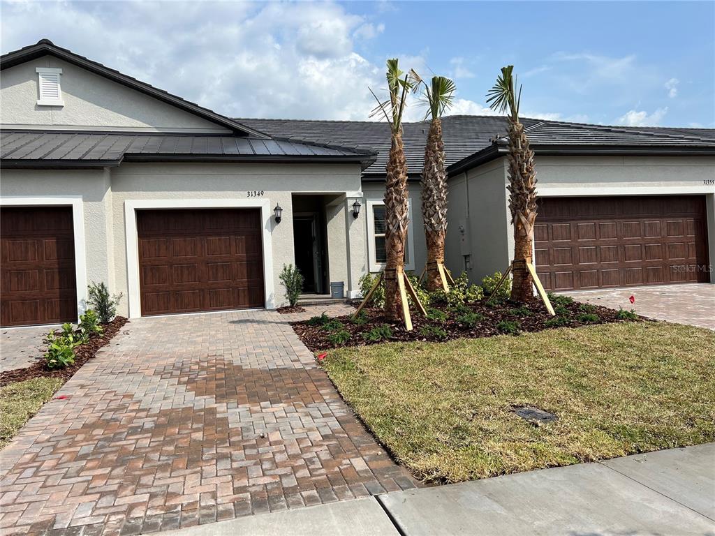 a view of a house with patio