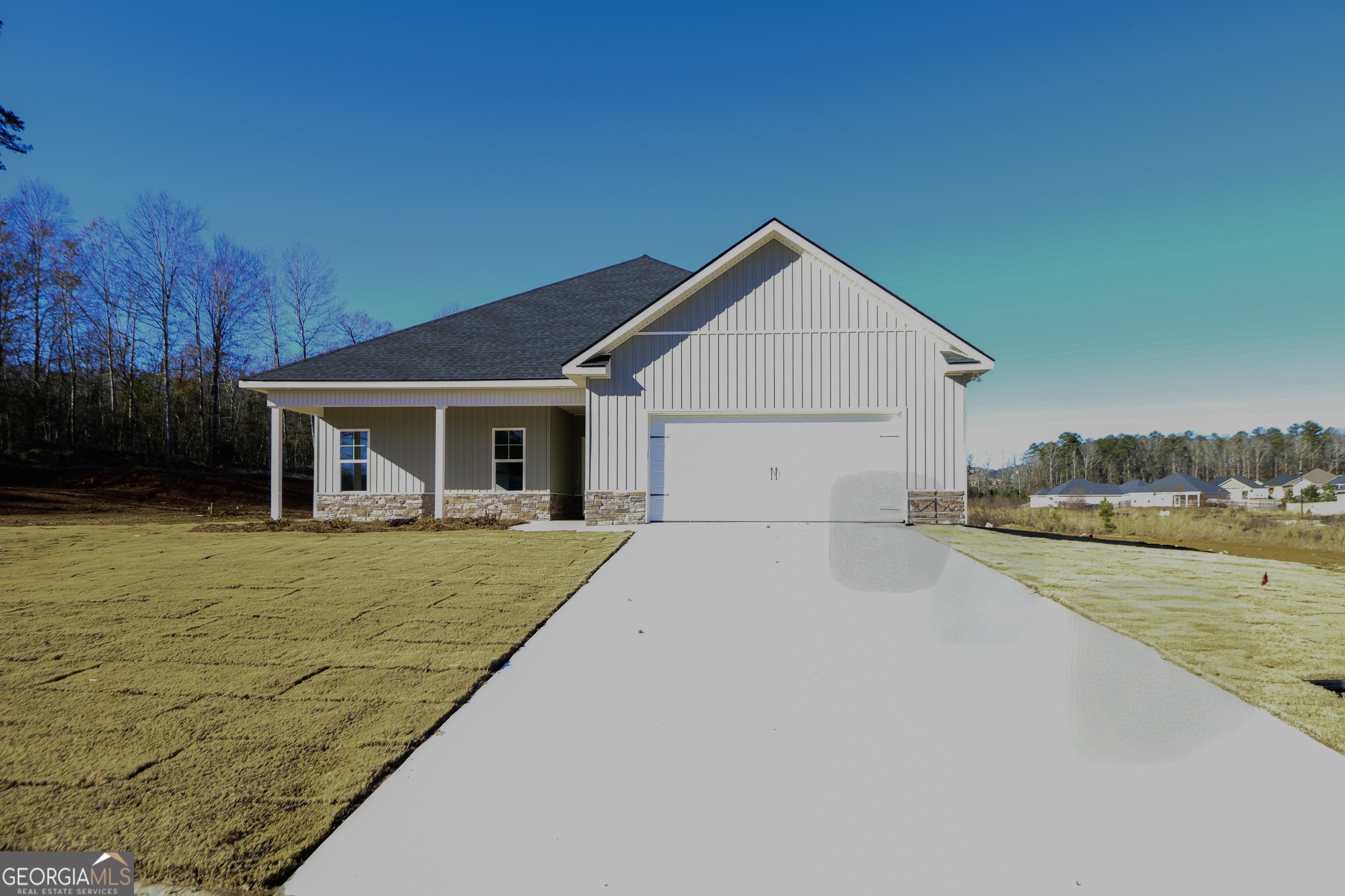 a view of a house with pool and a yard