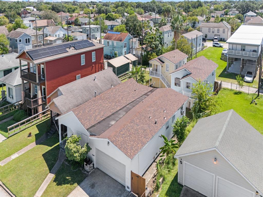 an aerial view of a house with a garden