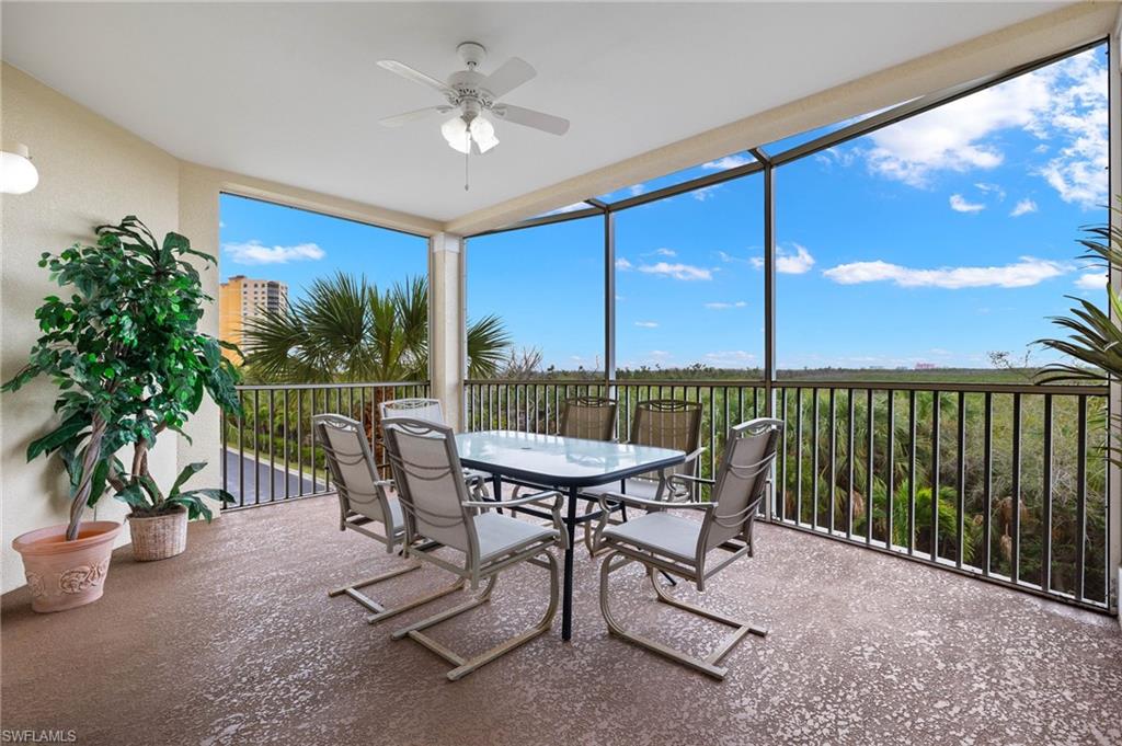 a view of a chairs and table in the patio