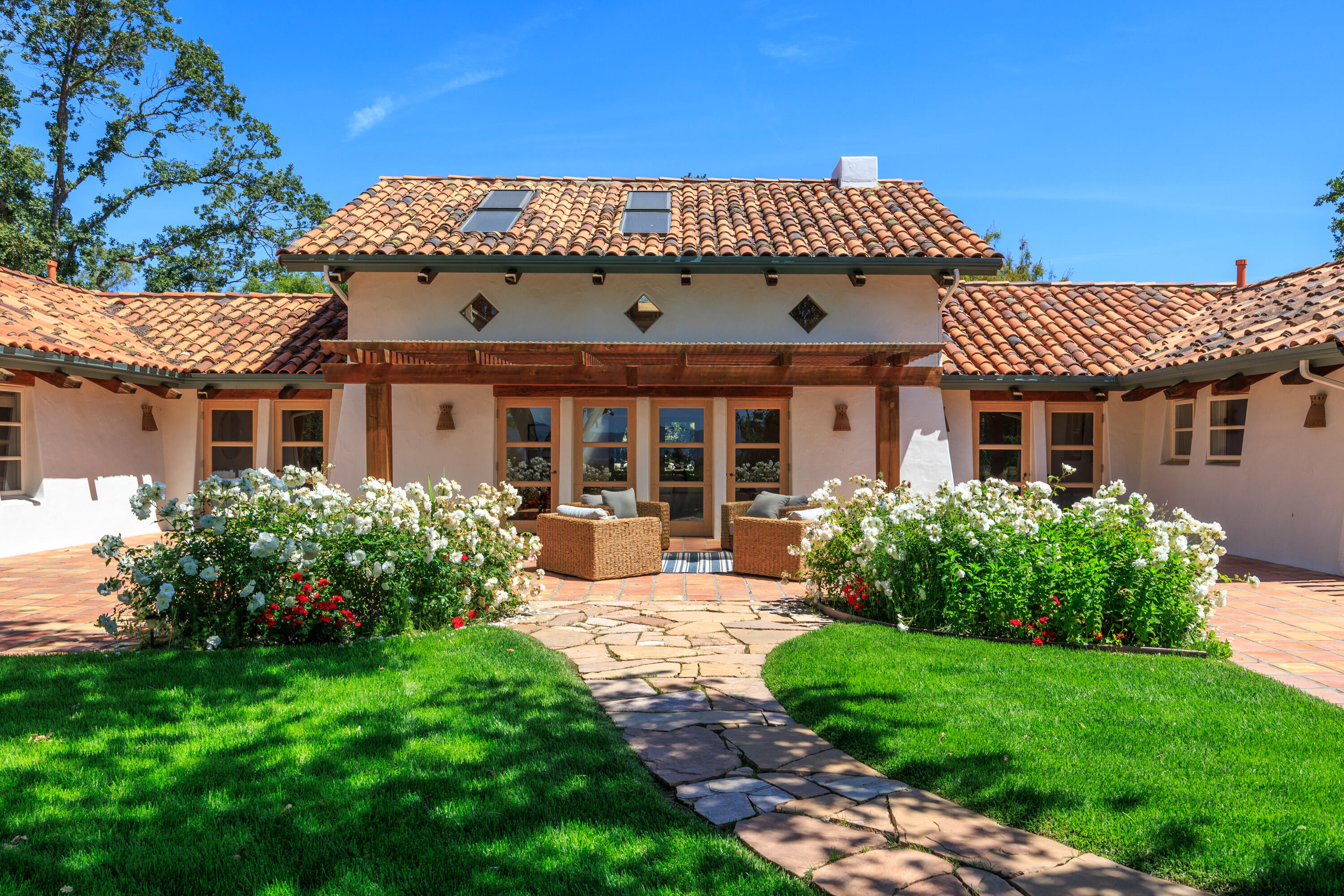 front view of a house with a yard