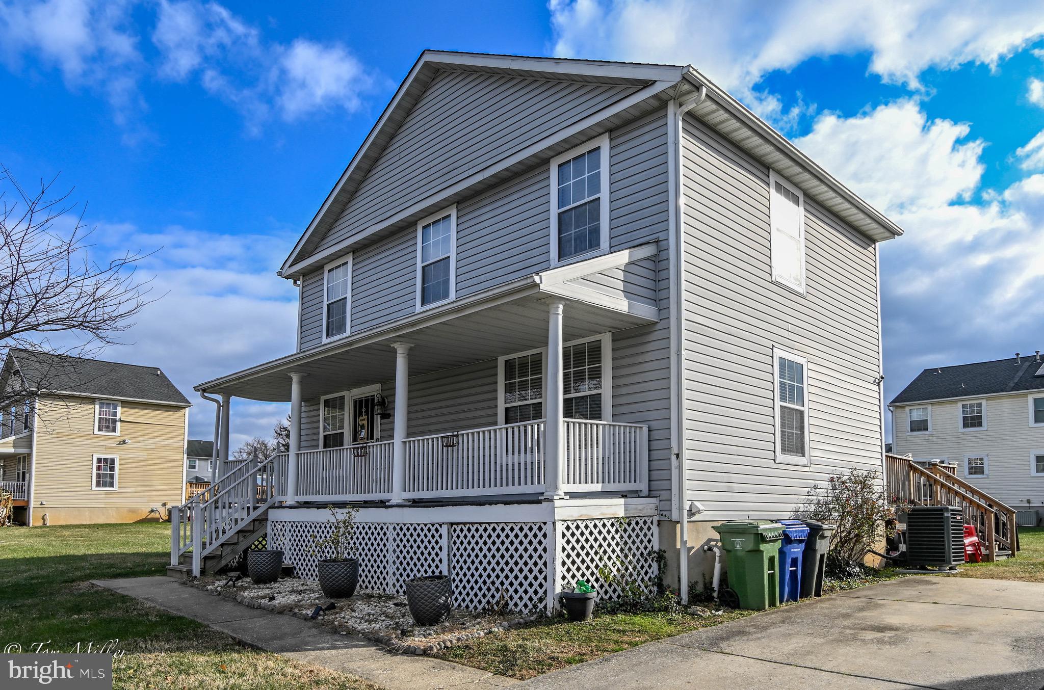 a front view of a house with garage