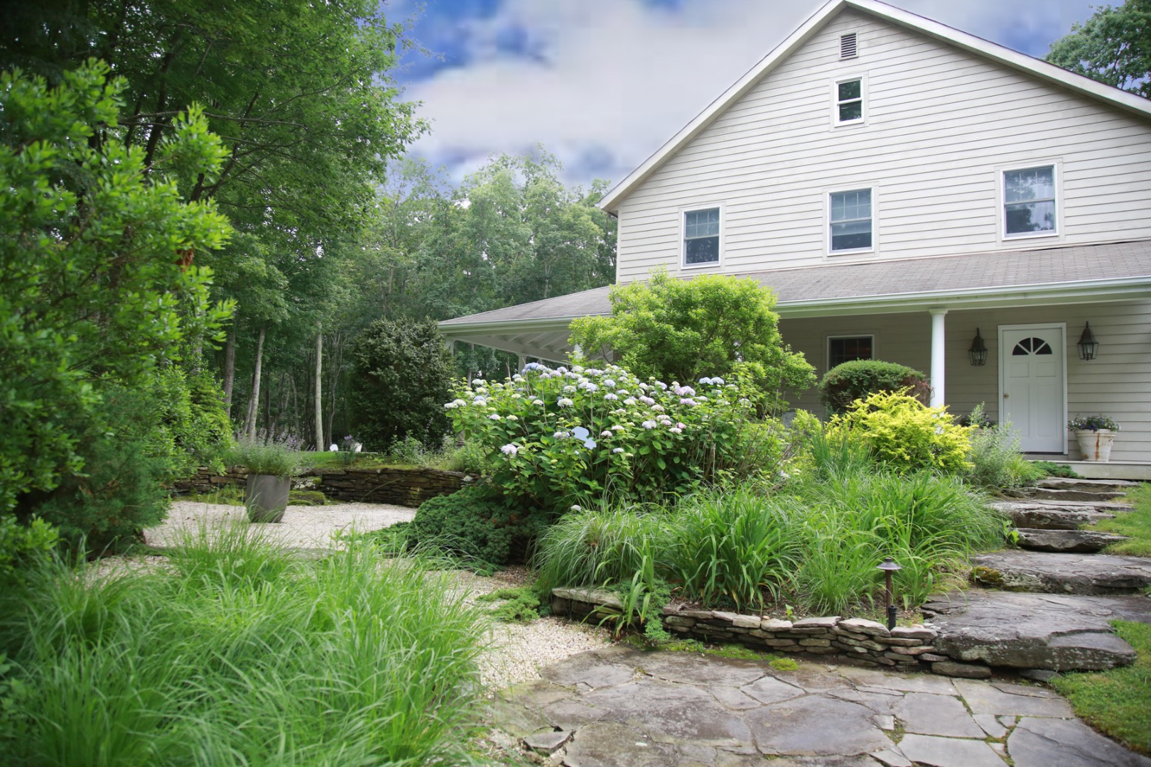 a house view with a garden space