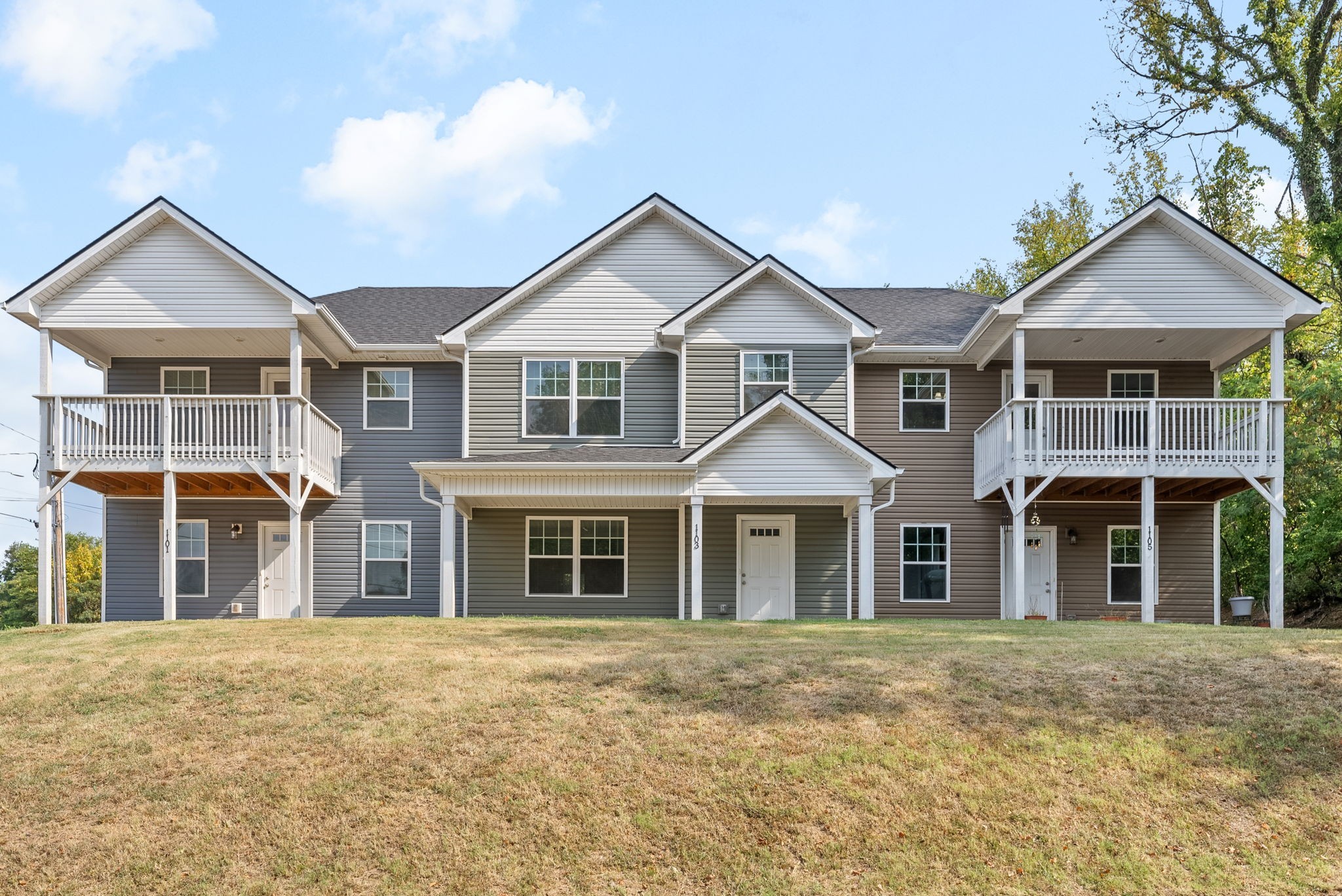 front view of a house with a yard