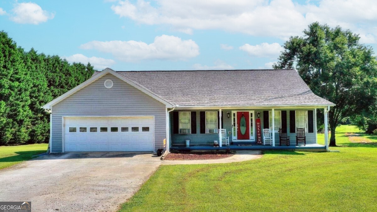 front view of a house with a yard