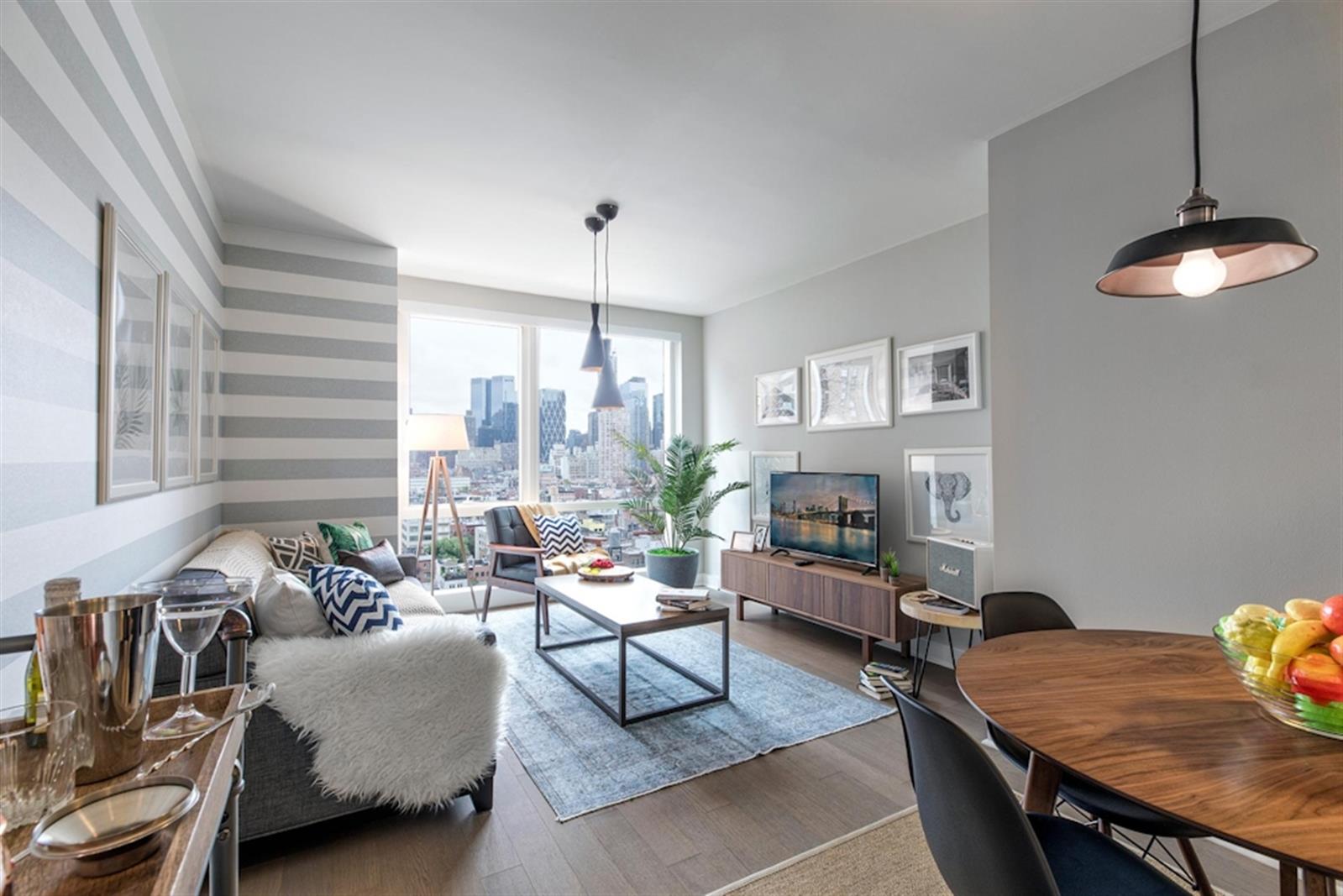 a living room with furniture and a table