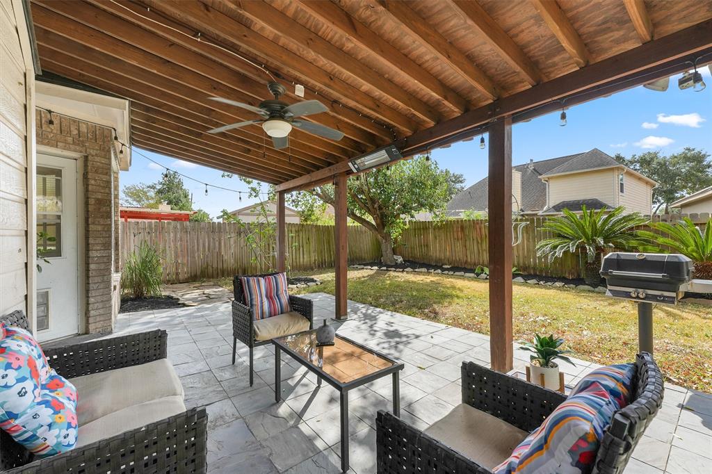 a outdoor living space with furniture and garden view