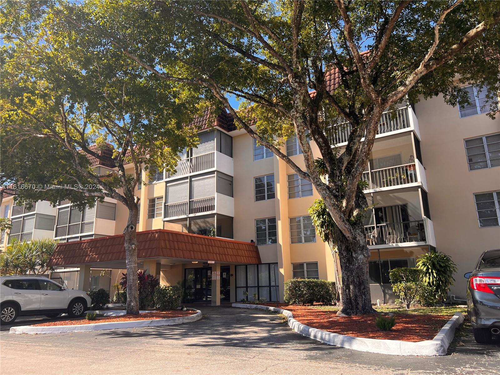 a front view of a building with street view