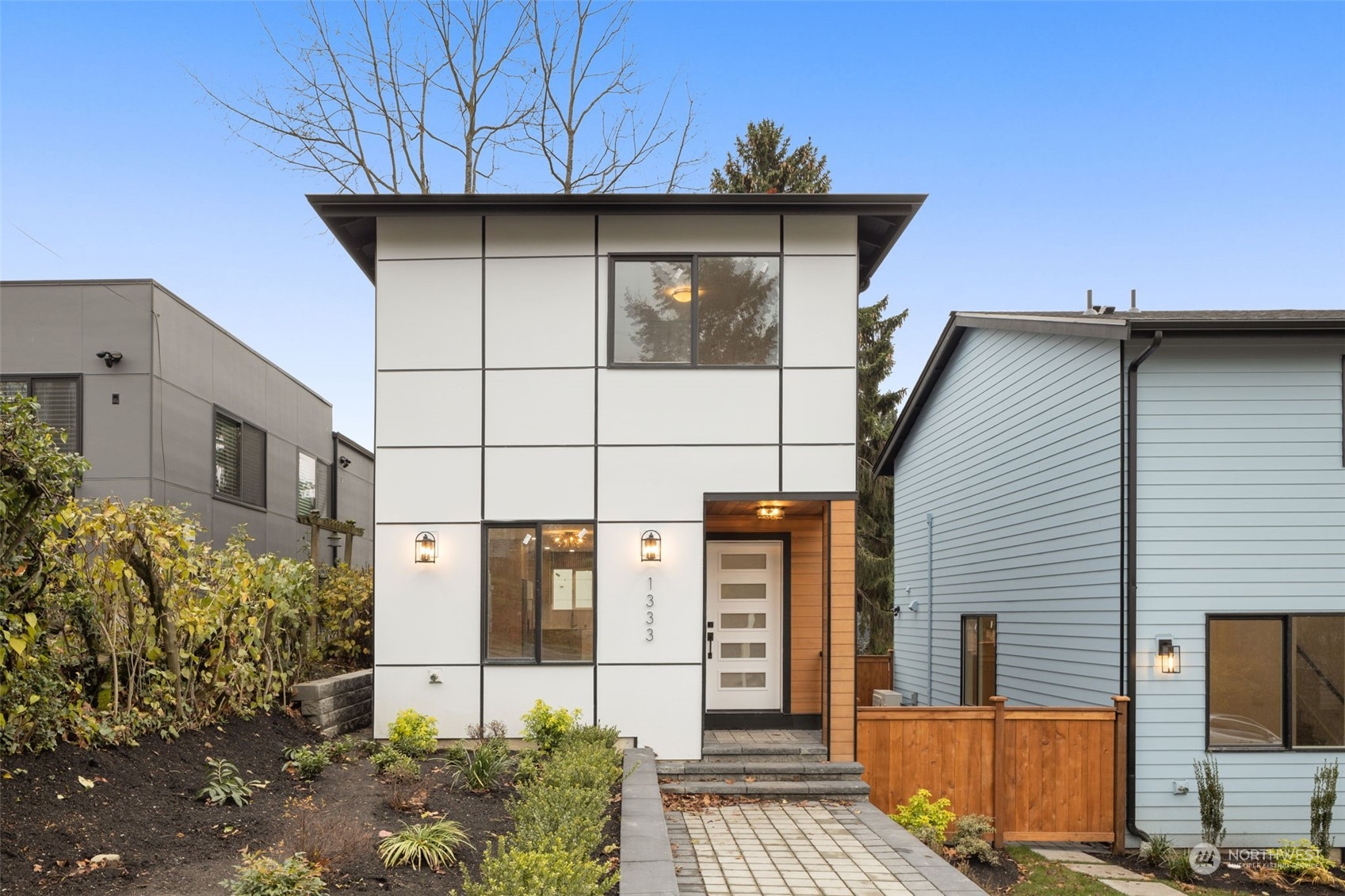 a view of a house with a garage