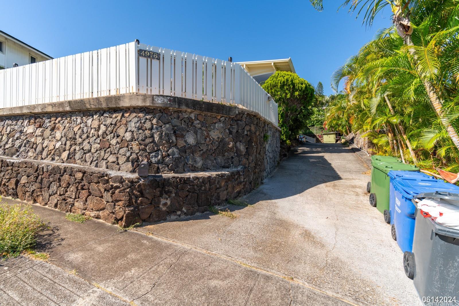 a view of a back yard of the house