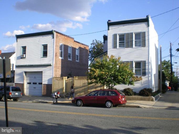 a cars parked in front of a house