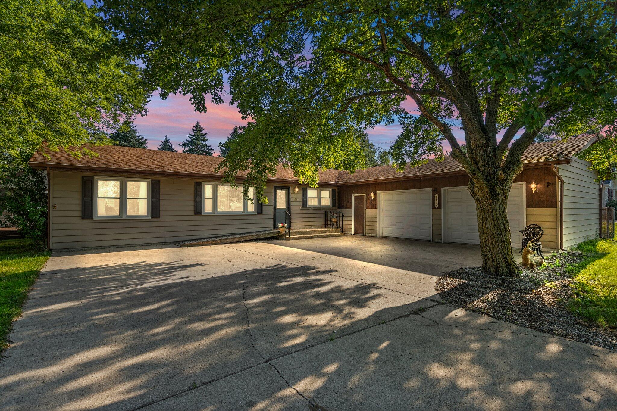 a house with trees in front of it