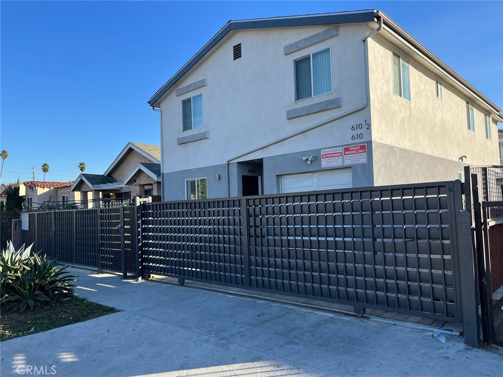 a front view of a house with a garage