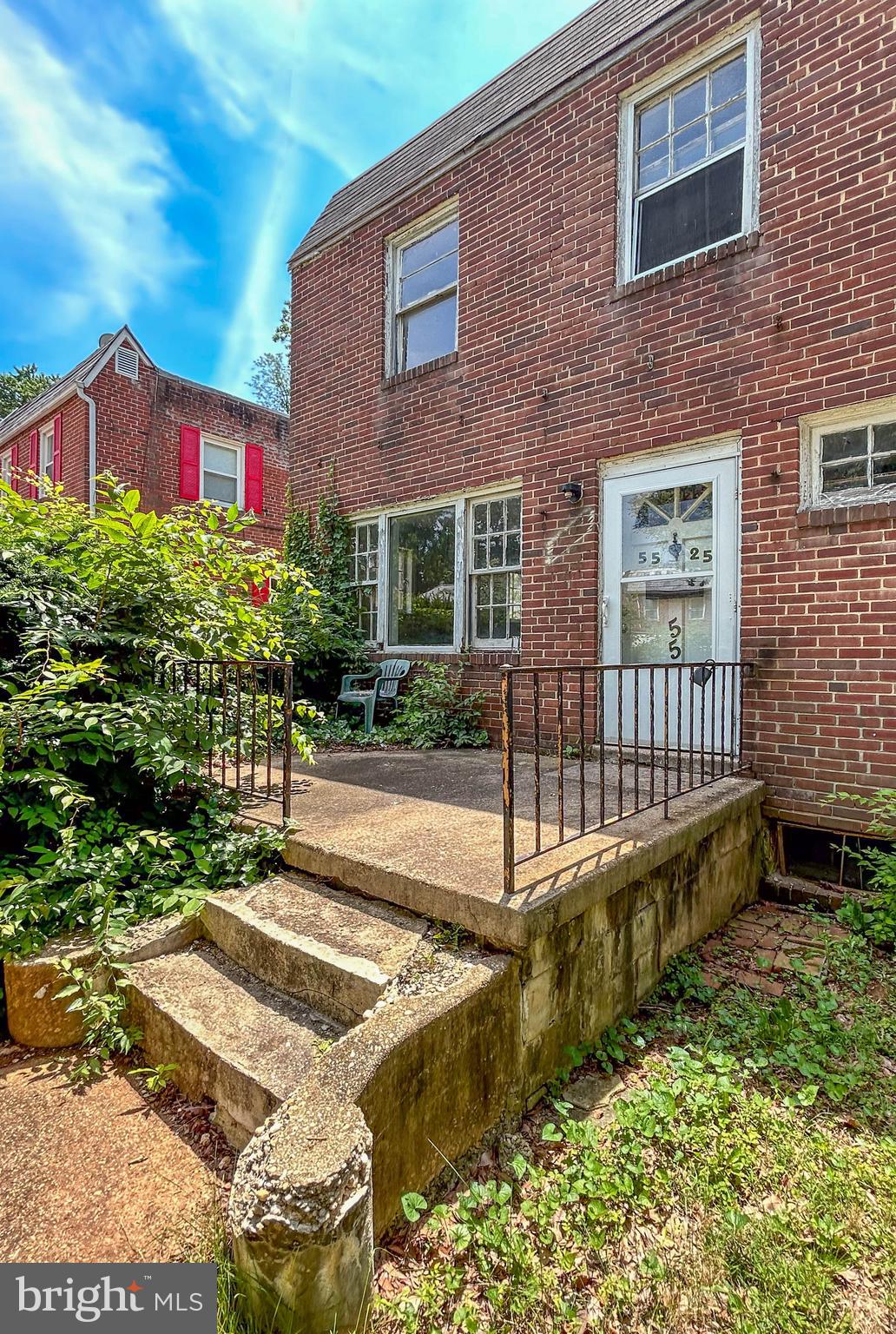 a house view with a garden space