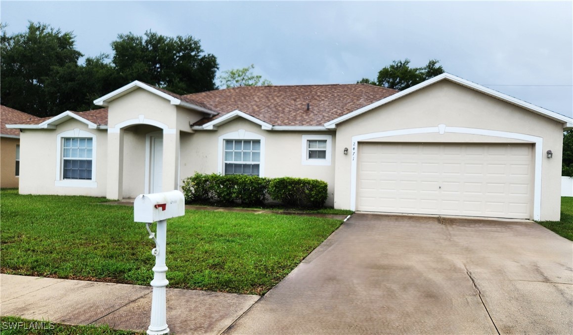 a front view of a house with yard