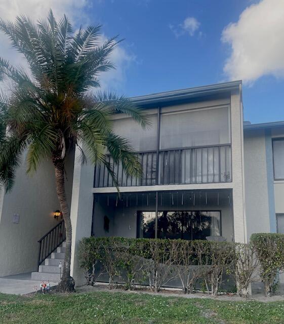 a view of a house with a balcony