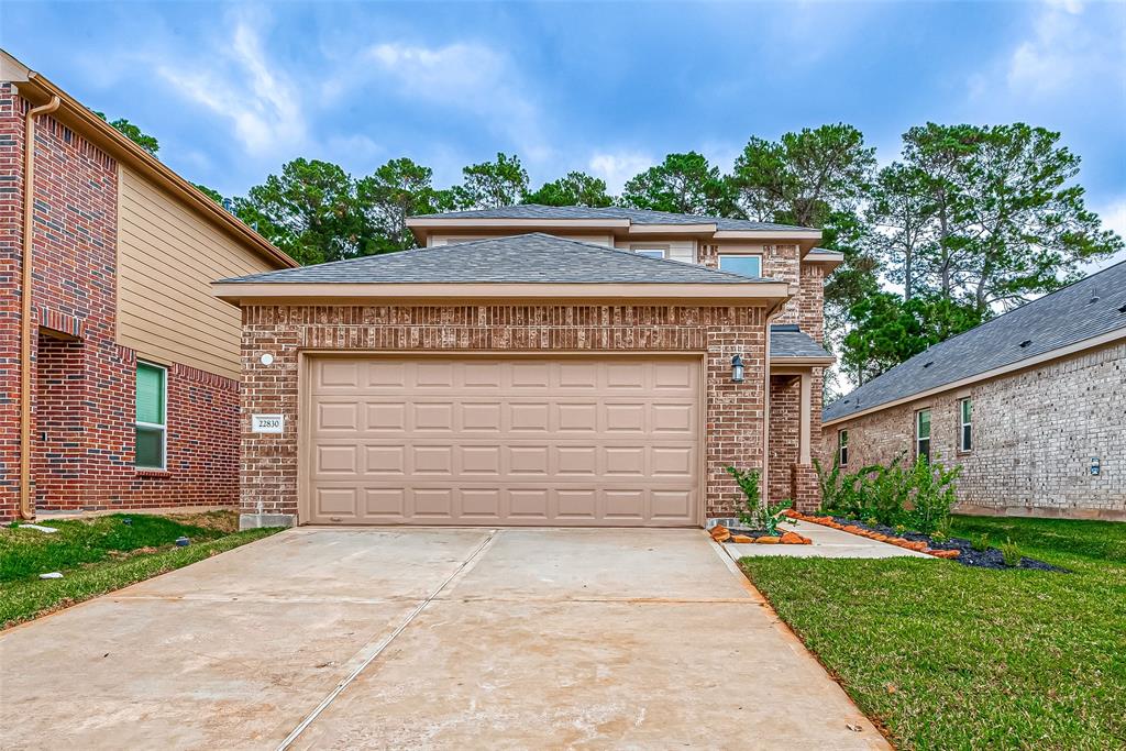 a view of a house with a garage