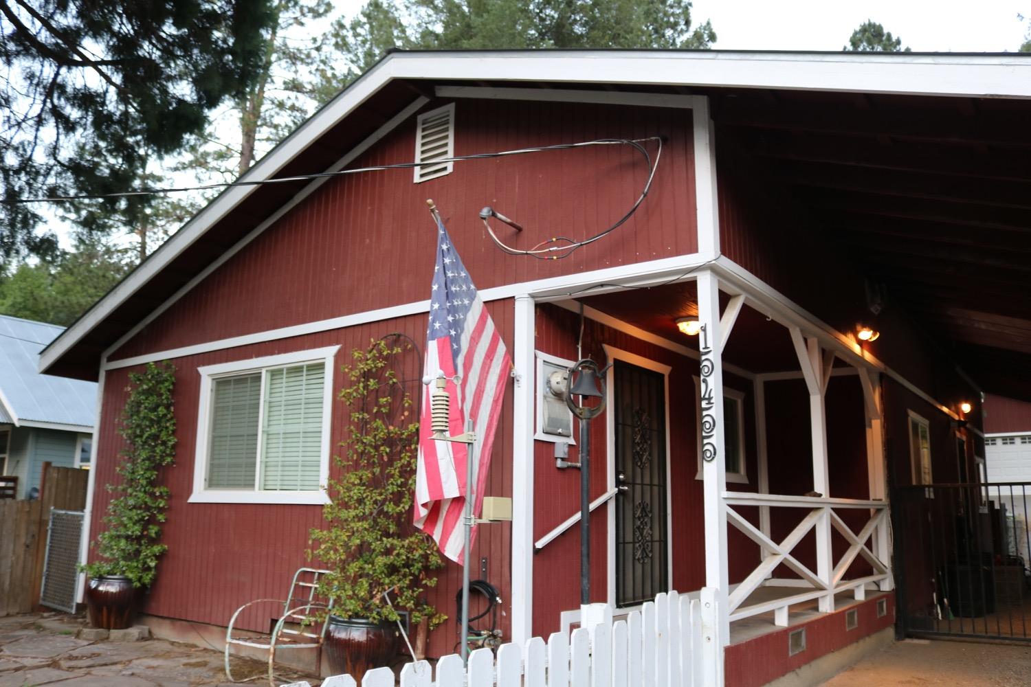 a front view of a house with parking