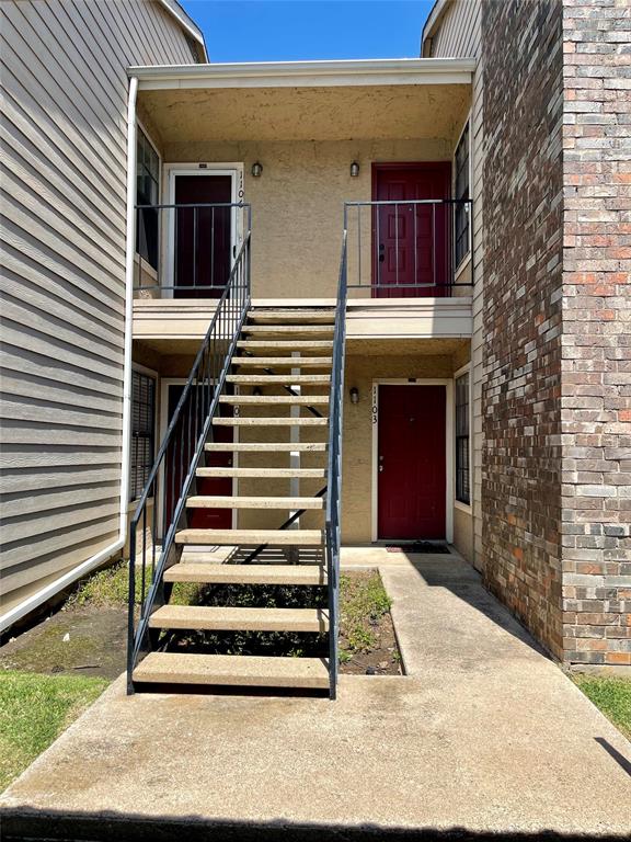 a front view of a house with a balcony