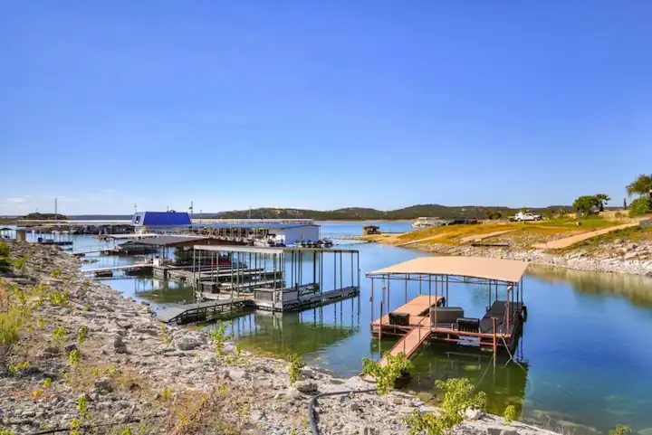 a view of a lake with nearby beach