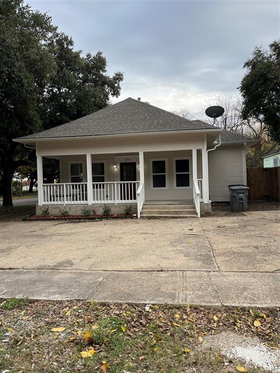 a front view of a house with garage