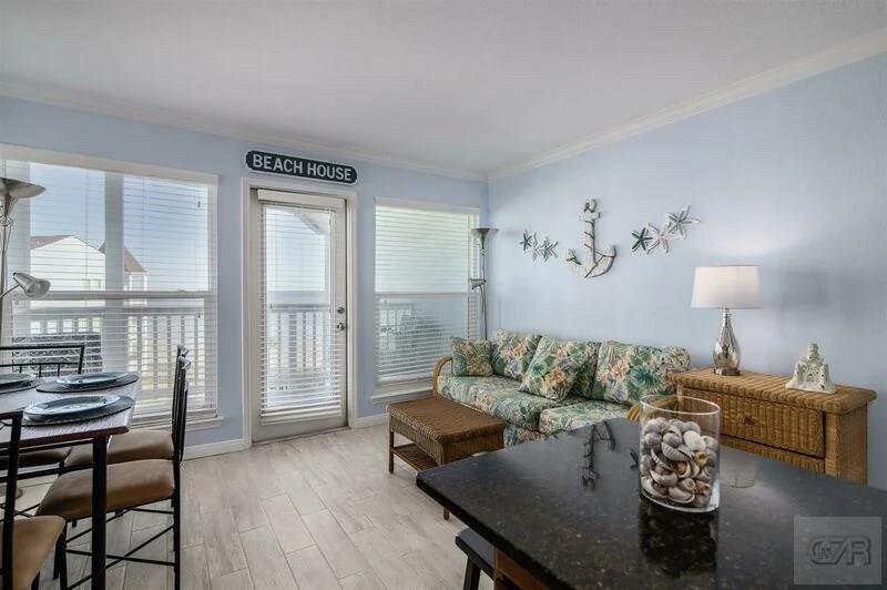 a living room with furniture and a table