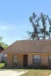 a view of house with outdoor space