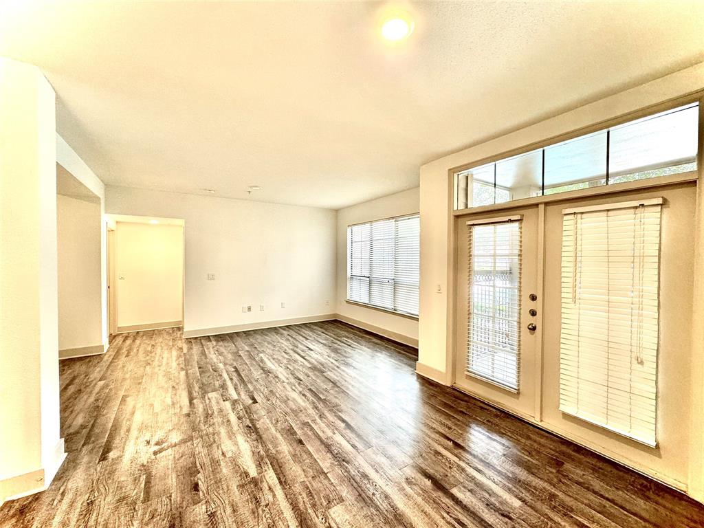 a view of an empty room and window