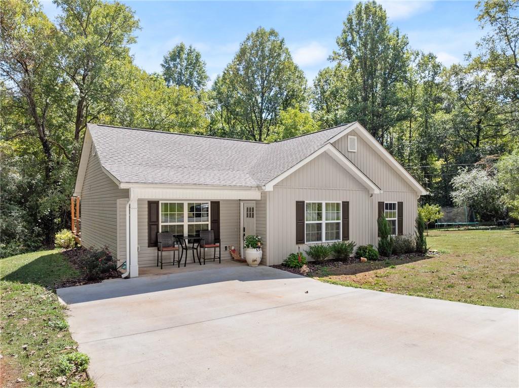 front view of a house with a yard