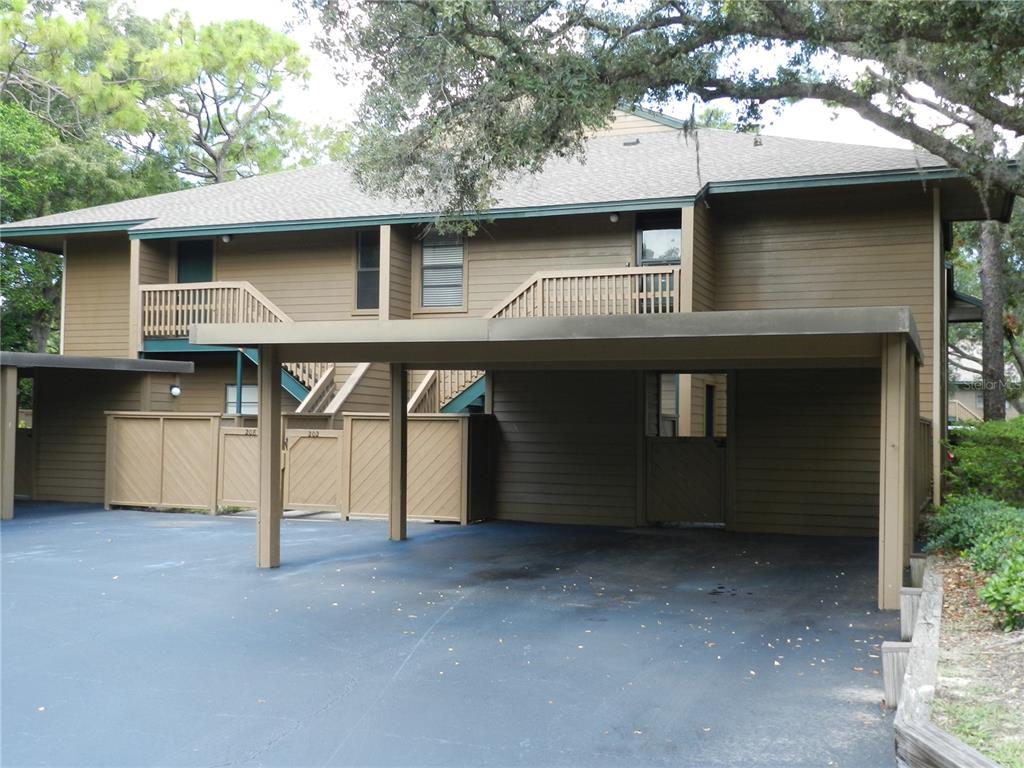 a front view of a house with garage